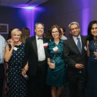 Guests posing in the Laker Lounge.